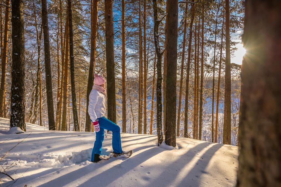 Woman in beautiful winter landscape